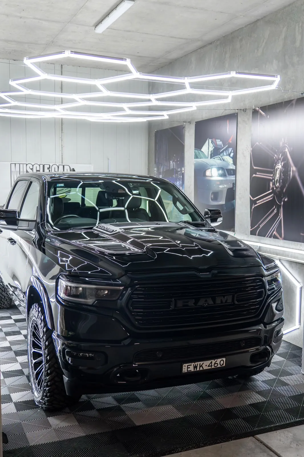 Black RAM 1500 with dark tinted windows in the studio